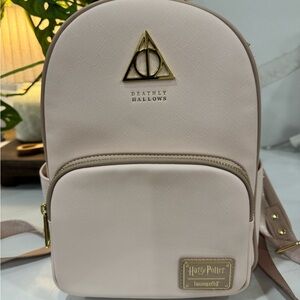 Loungefly Light Pink Harry Potter Backpack with Gold Accents